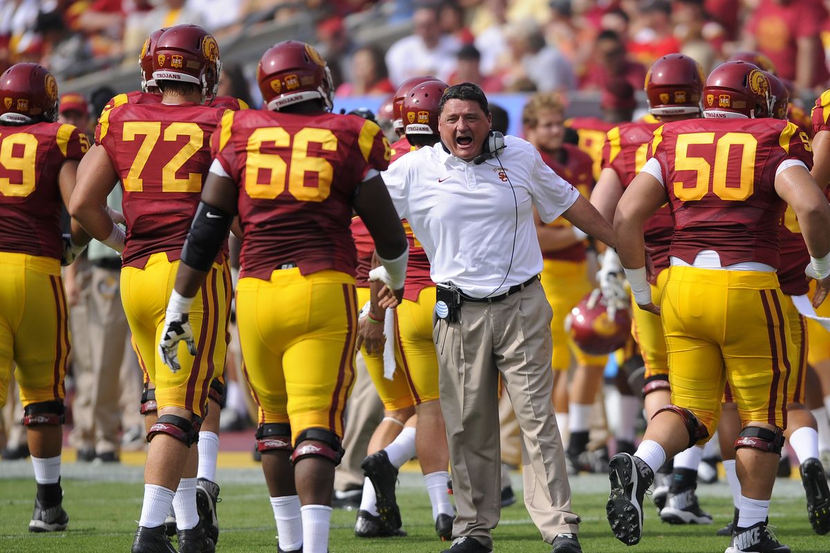 Interim head coach Ed Orgeron has USC on a roll with three straight conference wins. (Associated Press)