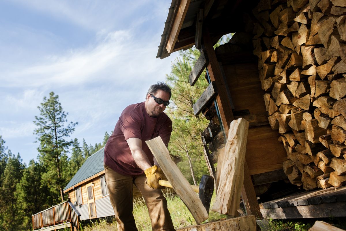 Wood split for a stove provides both light and a more sustainable heat source, especially compared to propane heaters. (TYLER TJOMSLAND PHOTOS)