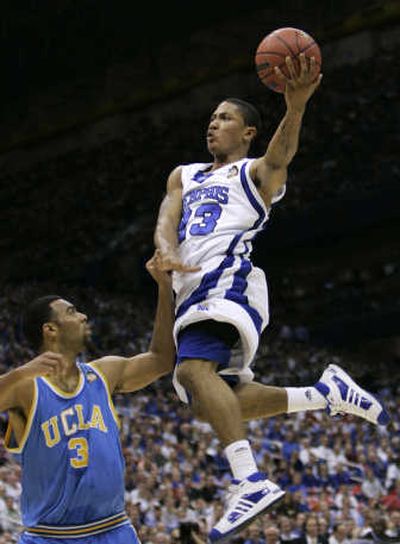 
Memphis' Derrick Rose soars over UCLA's Josh Shipp in the first half. Associated Press
 (Associated Press / The Spokesman-Review)