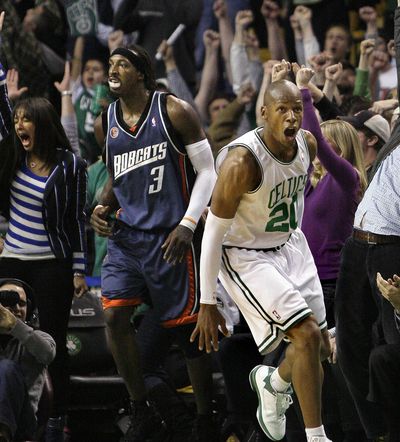 Boston’s Ray Allen, right, gets a kick out of his game-winning shot.  (Associated Press / The Spokesman-Review)