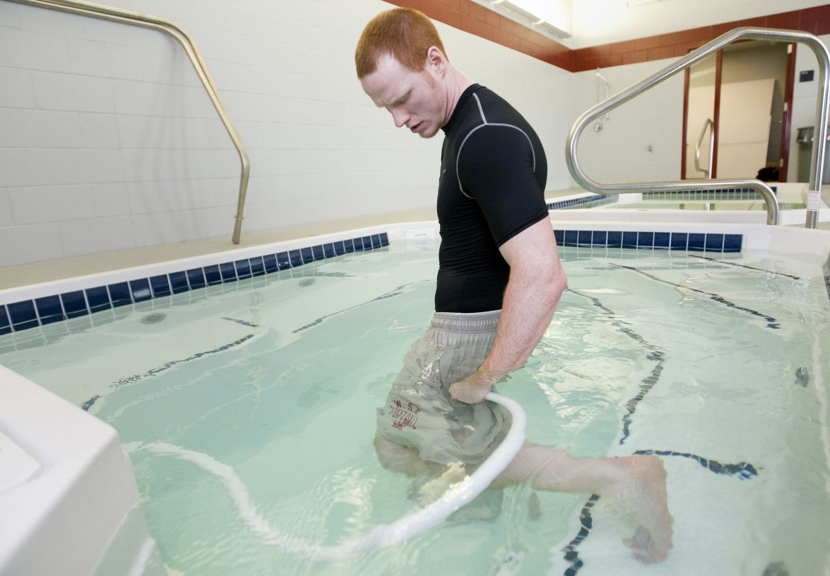 Special to The Spokesman-Review Marshall Lobbestael uses a pressurized water hose at WSU’s Cougar Mania Hydrotherapy Complex. (Tyler Tjomsland Special to / The Spokesman-Review)