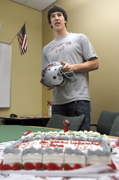 Friends, family and teammates brought cake and decorations as they watched Jake Rodgers of Shadle Park High School sign his letter of intent to play football at Washington State University on Wednesday, Feb. 3, 2010. His teammate Ryan Flores also signed a letter of intent to play at Montana Tech.
 (Christopher Anderson / The Spokesman-Review)