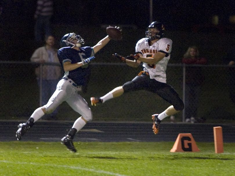 Lake City's Kaleb Mitchell kncosk down a pass near the goal lineintended for Post Falls' Jordan Pastras in the second quarter Friday night at Lake City HIgh in Coeur d'Alene. BRUCE TWITCHELL/ Special to The Spokesman-Review