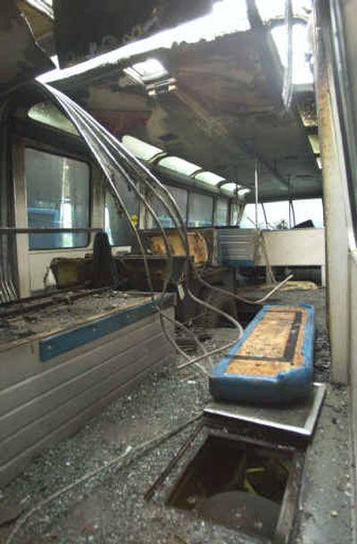 Fire-charred seats litter the inside of the Seattle monorail Blue Train on Tuesday as it sits in the depot at the Seattle Center in Seattle. Fire-charred seats litter the inside of the Seattle monorail Blue Train on Tuesday as it sits in the depot at the Seattle Center in Seattle.
(Associated PressAssociated Press / The Spokesman-Review)