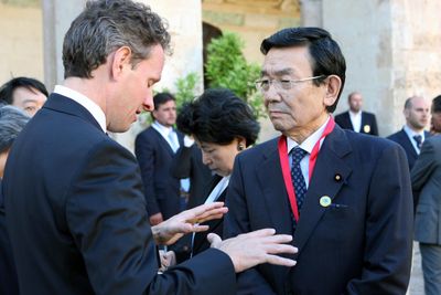 U.S. Treasury Secretary Timothy Geithner, left, talks with Japanese counterpart Kaoru Yosano at the G-8 meeting in Lecce, Italy, on Friday.  (Associated Press / The Spokesman-Review)