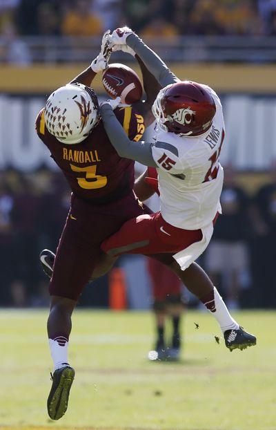 Arizona State's Damarious Randall (3) intercepts a pass intended for Washington State's Robert Lewis (15) in the first half of Pac-12 game in Tempe, Ariz. (Associated Press)