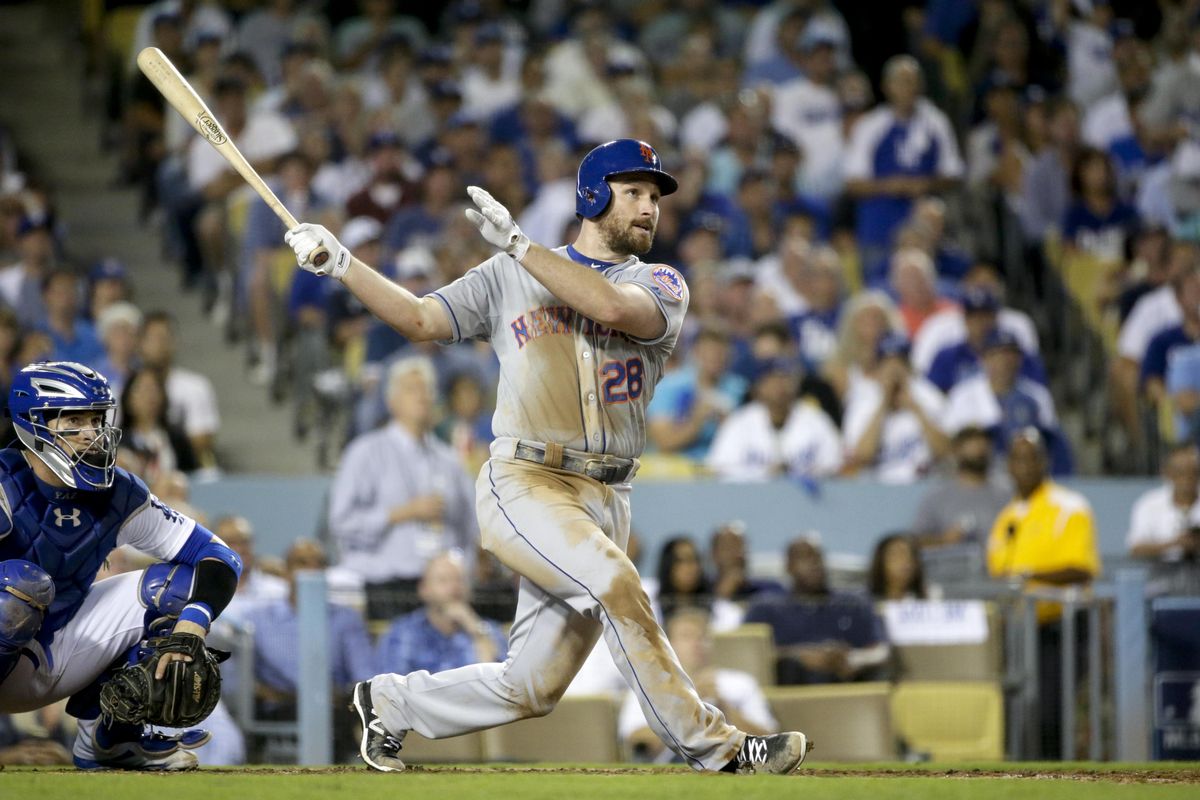 Mets’ Daniel Murphy watches his solo home run during the sixth inning in Game 5 of the NLDS won by New York 3-2. (Lenny Ignelzi / Associated Press)