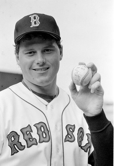 Boston Red Sox pitcher Roger Clemens poses with the game ball at Fenway Park in Boston on Wednesday, April 30, 1986. Clemens set a Major League Baseball record by striking out 20 batters against the Seattle Mariners. (ELISE AMENDOLA / AP)