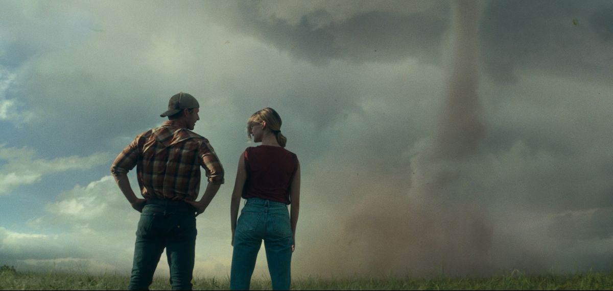 Glen Powell, left, and Daisy Edgar-Jones in "Twisters," directed by Lee Isaac Chung. (Universal Pictures/TNS)  (Universal Pictures, Warner Bros. Pictures, &amp; Amblin Entertainment)