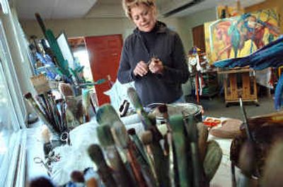 
Spokane artist Kay O'Rourke works in her studio while  preparing for an upcoming show. 
 (Joe Barrentine / The Spokesman-Review)