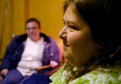 
At right, Melissia Dickson, 41, talks with her friend Angela Meador about trying to live on minimum wage Tuesday.  The two friends were waiting to have dinner at the Women's and Children's Free Restaurant. 
 (CHRISTOPHER ANDERSON / The Spokesman-Review)