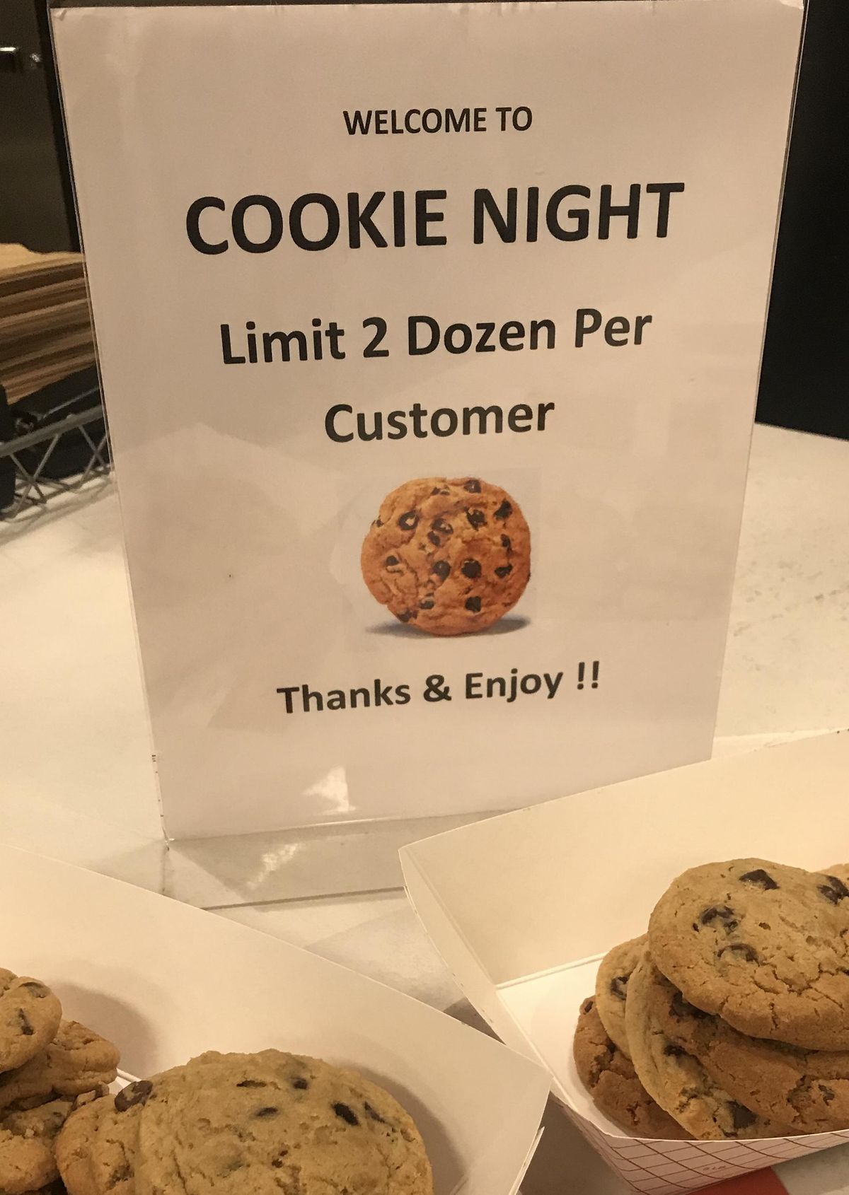A sign at SubCo reminds students there’s a limit of two dozen cookies per customer during Cookie Night at GU. (Crissy Belle Lubke)