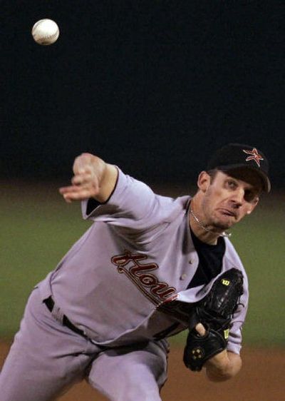 
Roy Oswalt is 4-0 in seven career playoff appearances after pitching Houston past St. Louis on Wednesday. 
 (Associated Press / The Spokesman-Review)