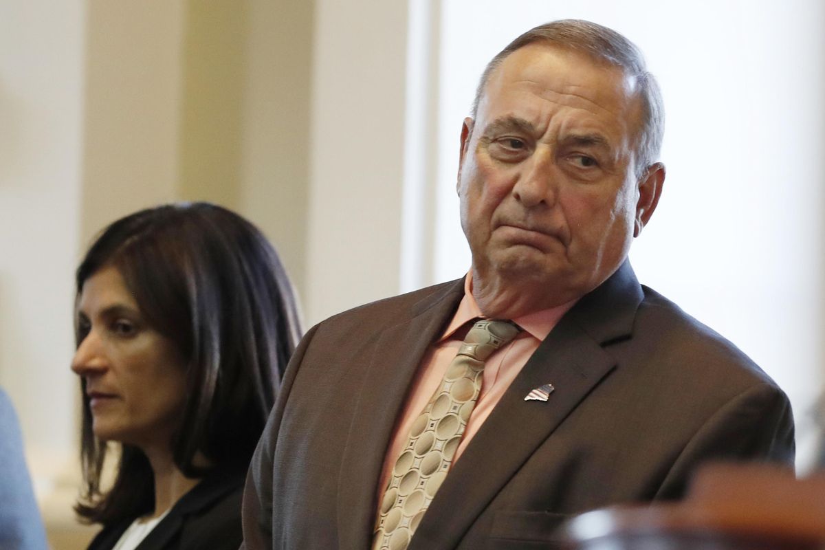 In this Monday, Dec. 19, 2016 file photo Maine Republican Gov. Paul LePage, right, and House Speaker Sara Gideon, D-Freeport, attend the Electoral College vote at the State House in Augusta, Maine. The Republican governor on Tuesday, Jan. 17, 2017, addressed Rep. John Lewis
