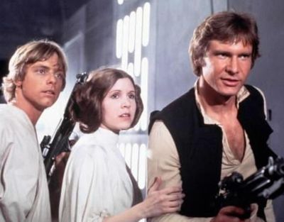 Luke Skywalker (Mark Hamill), Princess Leia (Carrie Fisher) and Han Solo (Harrison Ford) search for an escape route on the maze-like Imperial Death Star in “Star Wars: A New Hope.” (1997 LUCAS FILM LTD photo)