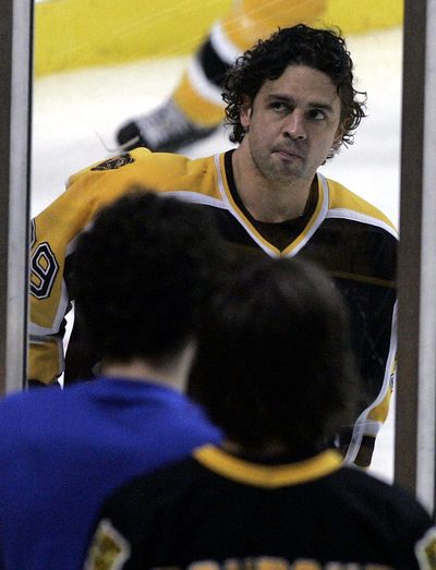 Travis Green can look upon his 17 years of experience as a professional player in his new role of assistant coach in Portland. (File Associated Press / The Spokesman-Review)