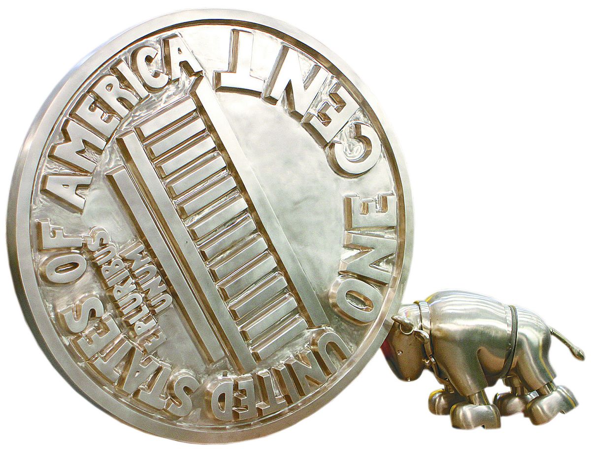 “Bull Pushes Penny,” by New York artist Tom Otterness.