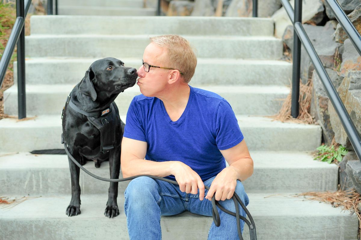Eric O’Grey poses with his new rescue dog, Jake. (Vanessa Mathisen)