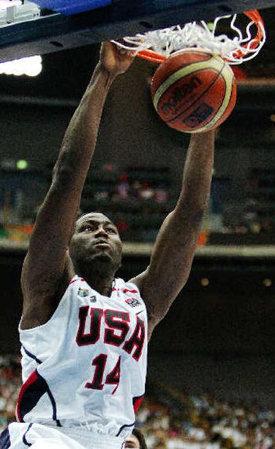 
Elton Brand dunks during the United States' easy win over Australia today.
 (Associated Press / The Spokesman-Review)