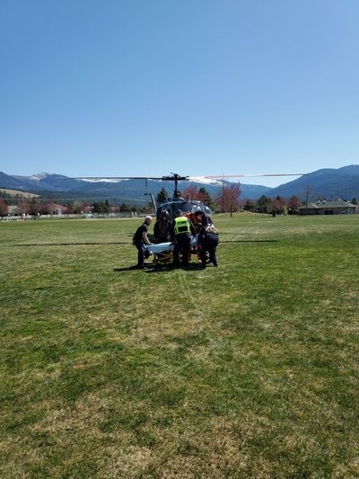 Flight crews on the Spokane County Sheriff's Office's Air 1 helicopter hoisted an injured hiker after a fall in Liberty Lake Regional Park and flew her to Pavilion Park, shown here, where she was treated by AMR.  (Courtesy of SCSO Air 1 Twitter)