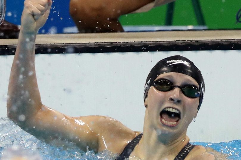 United States’ Katie Ledecky lets out a scream after winning the gold medal in the women’s 400-meter freestyle setting a world record on Sunday. (Lee Jin-man / Associated Press)