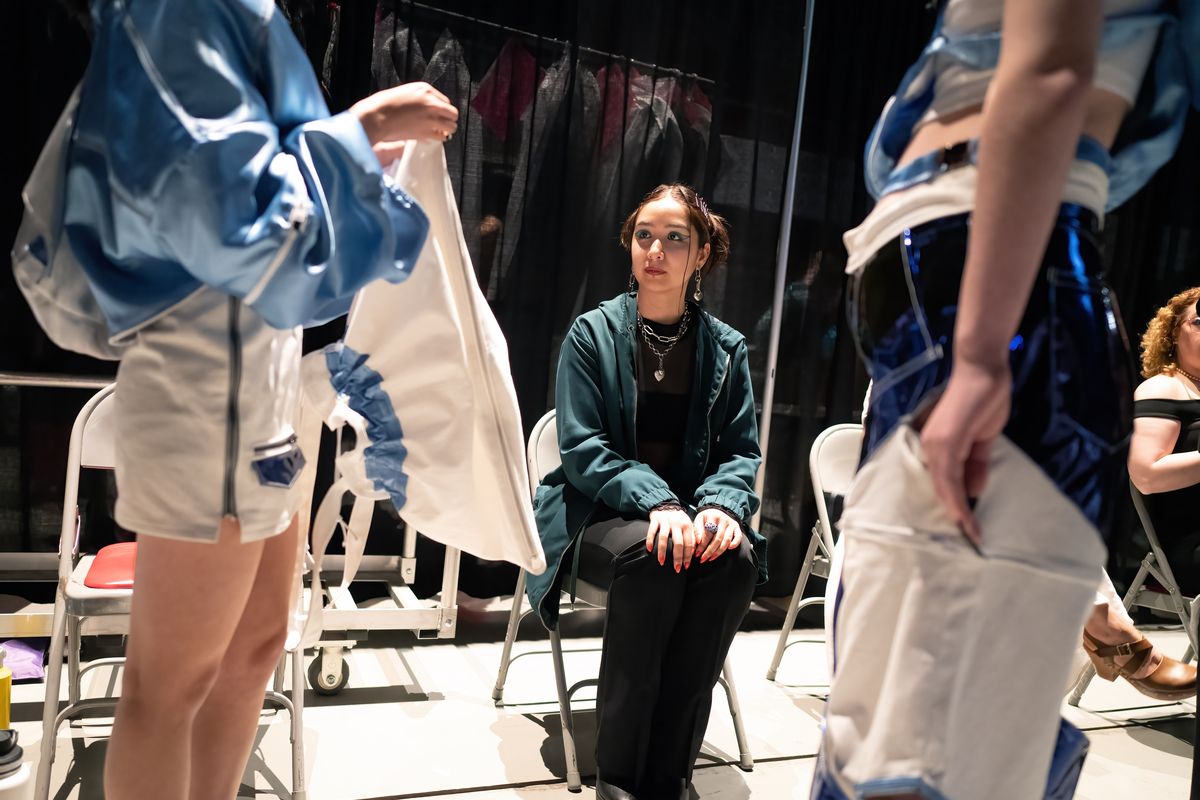 WSU student designer Stephanie Castro nervously waits with her models backstage during the 40th annual AMDT Fashion Show held March 31 in the Beasley Coliseum in Pullman.  (COLIN MULVANY/THE SPOKESMAN-REVIEW)