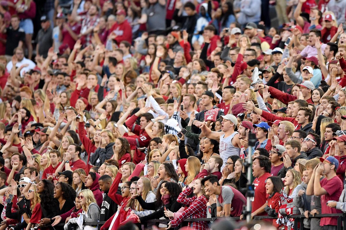 WSU fans react as the clock winds down during the second half of the Cougars’  game on  Sept. 29 at Martin Stadium in Pullman. WSU won  28-24. (Tyler Tjomsland / The Spokesman-Review)