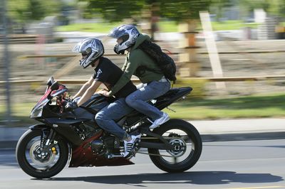 Motorcyclists head south on Hamilton Street last week near the Gonzaga campus.  (Dan Pelle / The Spokesman-Review)