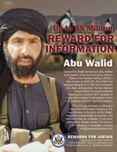This undated image provided by Rewards For Justice shows a wanted posted of Adnan Abu Walid al-Sahrawi, the leader of Islamic State in the Greater Sahara. French President Emmanuel Macron announced the death of al-Sahrawi Wednesday, Sept. 15, 2021, calling the killing “a major success” for the French military after more than eight years fighting extremists in the Sahel. Macron tweeted that al-Sahrawi “was neutralized by French forces” but gave no further details.  (HOGP)