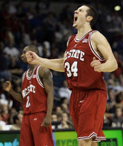 
North Carolina State's Ben McCauley (34) celebrates as he walks off court following a 72-64 win over Virginia Tech. 
 (Associated Press / The Spokesman-Review)