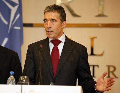 NATO Secretary-General Anders Fogh Rasmussen speaks to reporters in Tripoli, Libya, on Monday. (Associated Press)