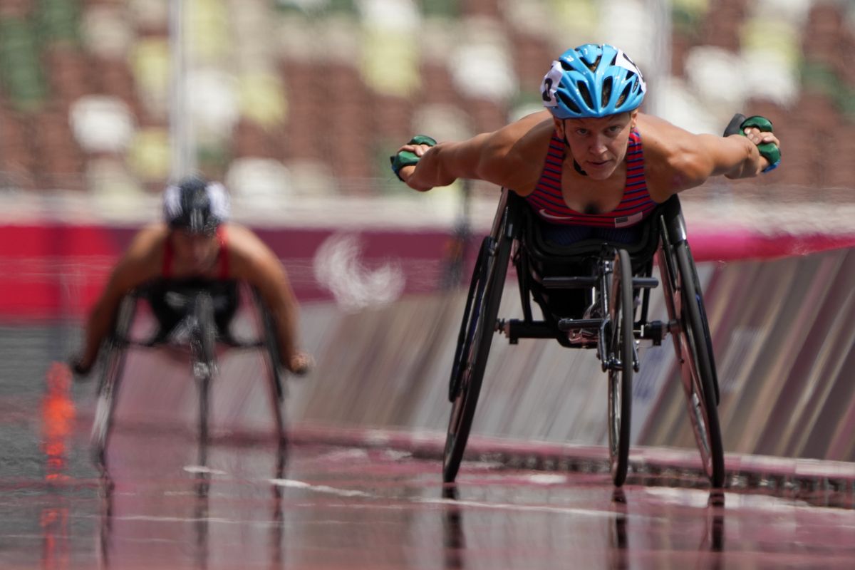 United States’s Susannah Scaroni wins the women’s 5000-meters T54 final during the 2020 Paralympics at the National Stadium in Tokyo, Saturday, Aug. 28, 2021.  (Associated Press)