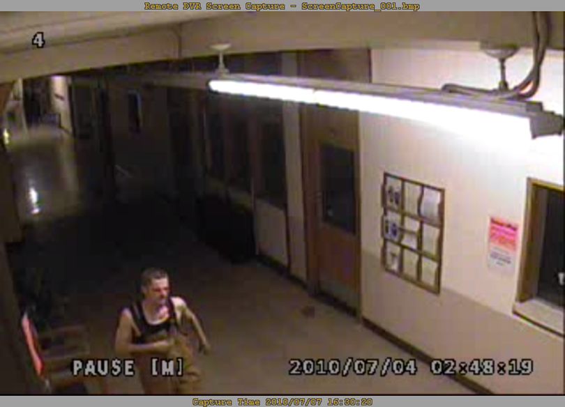 Police are looking for help identifying a burglar who stole electronics from two Spokane Valley schools in early July.
The thief ransacked the Valley Christian School, 10212 E. Ninth, and the Early Learning Center, 10304 E. Ninth, the first weekend of July. 
Security video shows a man at Valley Christian School about 2:30 a.m. July 3 walking through hallways and trying to open doors and windows.  An Ipod and a small amount of cash were stolen, along with three laptops from the Early Learning Center.
The burglar is a then white man who wore Carhartt-style overalls and a black sleeveless shirt. Anyone with information on him is asked to call Crime Check at (509) 456-2233. (Spokane County Sheriff's Office)