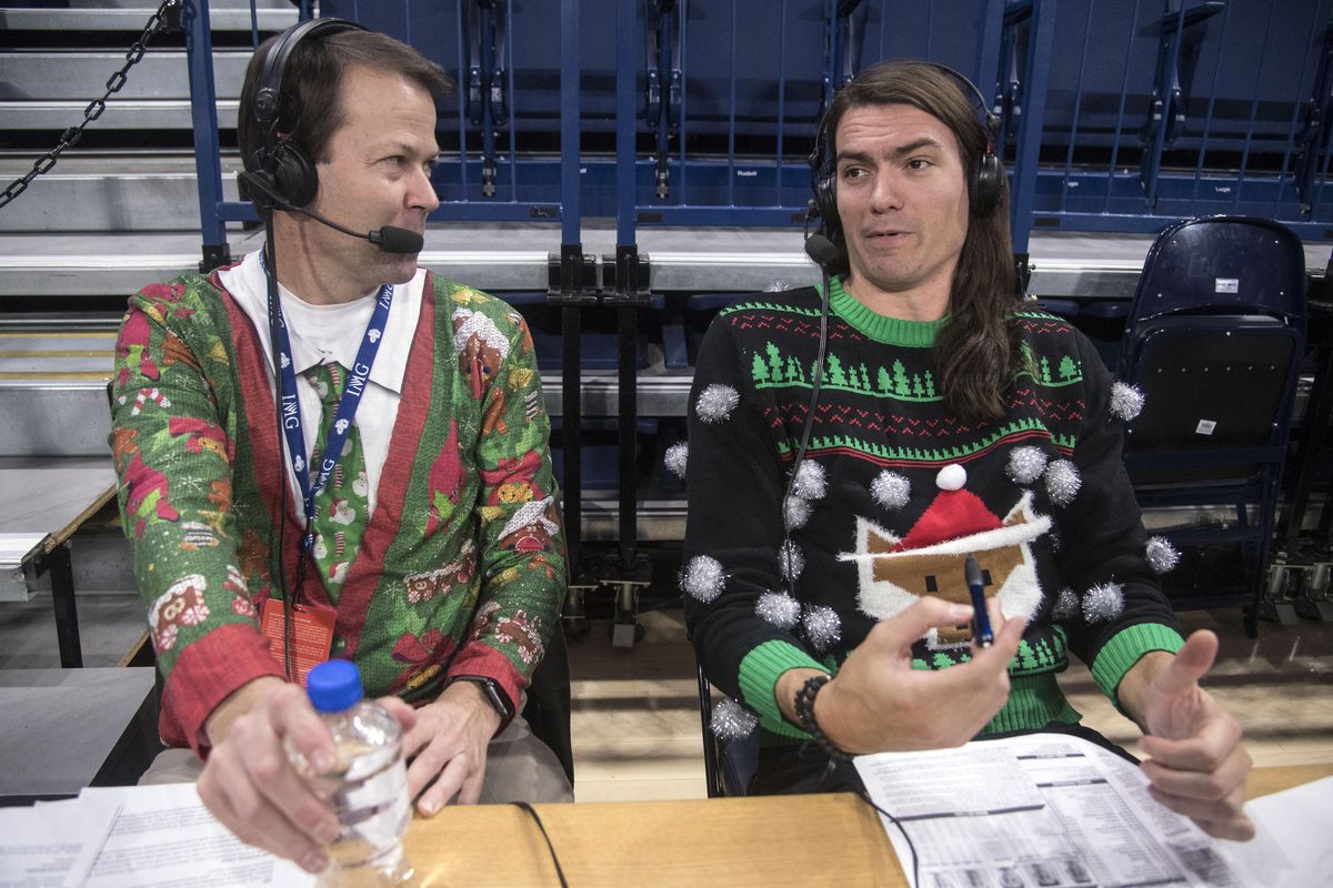 Gonzaga radio broadcasters Tom Hudson and Adam Morrison wear their best holiday attire as they prepare for the IUPUI game, Monday, Dec. 18, 2017 in the McCarthey Athletic Center. (Dan Pelle / The Spokesman-Review)