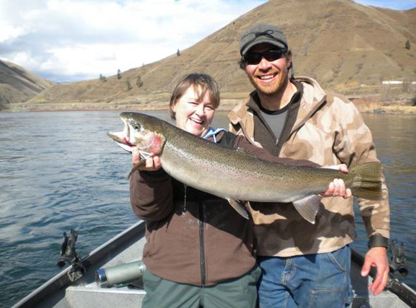 Sara Wiemerslage with her 33-inch hatchery steelhead caught on the Salmon River near Riggins, Idaho, with fishing guide Brent Sawyer on Sunday March 6, 2011. (Exodus Wilderness Adventures)