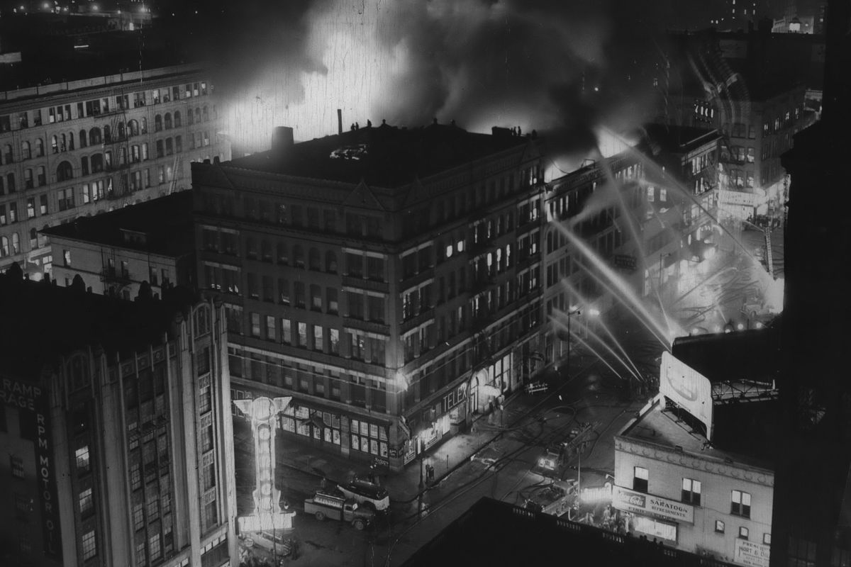 1950: The fire that destroyed the Ridpath Hotel in February 1950 was one of the worst in the city’s history, causing damage to almost every building on the block, though the Symons Block was mostly spared. The blaze started in the basement but no cause was determined. After the wreckage was cleared, the owners built a 12-story modern tower in 1951, incorporating most of the block. In the 1960s, they added convention rooms and a motel, the Ridpath Motor Inn, with a skywalk across West First Avenue.  (Spokesman-Review Photo Archives)
