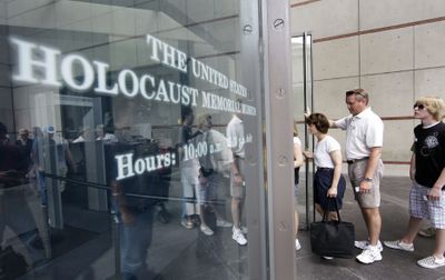 Visitors line up to enter the U.S. Holocaust Memorial Museum in Washington on Friday.  (Associated Press / The Spokesman-Review)