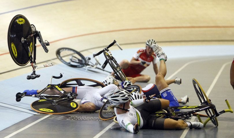 A crash involving Australia's Belinda Goss,  foreground right , Russia's Evgeniya Romanyuta, at left, Italy's Giorgia Bronzini partially seen, and Shelly Evans of the US, during the Women's Scratch Race at the World Track Cycling Championship, in the Ballerup Arena, Copenhagen, Denmark, Friday, March, 26,  2010. The race was won by Pascale Jeuland of France. (Alastair Grant / Associated Press)