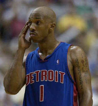 
Pistons point guard Chauncey Billups has worked up a sweat schooling the Lakers' Gary Payton and Derek Fisher. 
 (Associated Press / The Spokesman-Review)