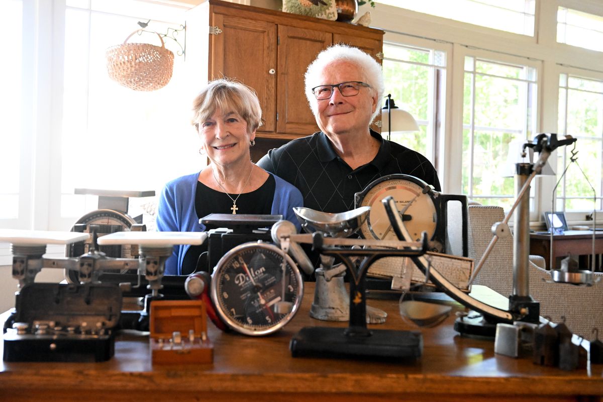 Jack and Shirley Vines show off their collection of scales on June 19 at their home in Spokane.  (Tyler Tjomsland/The Spokesman-Review)