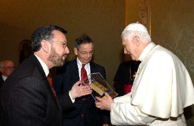 
In this picture released by the Vatican newspaper L'Osservatore Romano, Pope Benedict XVI is greeted by Rabbi David Rosen, left, international director of interreligious affairs for the American Jewish Committee, and AJC President E. Robert Goodkind at the Vatican in March. 
 (Associated Press / The Spokesman-Review)