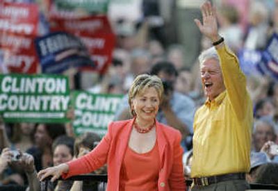 
Former President Bill Clinton joins U.S. Sen. Hillary Rodham Clinton, D-N.Y., during a rally at the Iowa state fairgrounds.Associated Press
 (Associated Press / The Spokesman-Review)