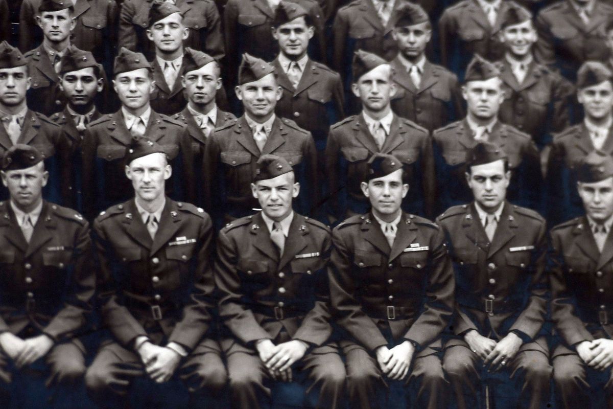 The photograph taken in 1945 at Quantico includes WWII veteran Dean Ladd, front row seated fourth from left is on display at his home in Spokane on Monday, August 24, 2020.He served in the Pacific and was set to participate in V-J anniversary ceremonies on Sept. 2 aboard the USS Missouri in Pearl Harbor but the trip was cancelled due to Covid-19.  (Kathy Plonka/The Spokesman-Review)