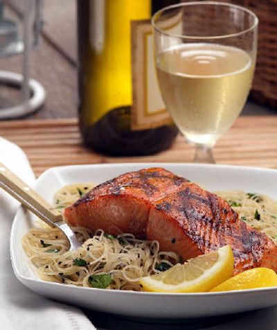 
Honey-Soy Grilled Salmon with Cilantro Noodles pairs grilled salmon with a light Asian noodle salad. The recipe takes only about 30 minutes to make. 
 (Associated Press / The Spokesman-Review)