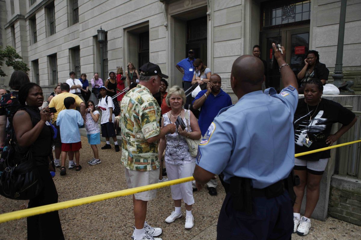 Police barricade museum visitors outside the U.S. Holocaust Memorial Museum in Washington, D.C., on Wednesday.Associated Press photos (Associated Press photos / The Spokesman-Review)