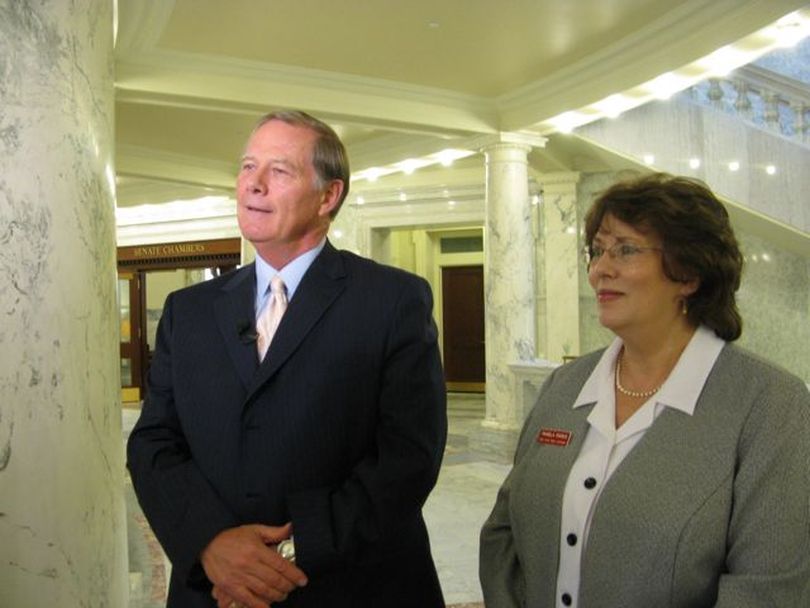 Roger Madsen, left, state Department of Labor director, and Pam Parks, right, director of the Idaho Human Rights Commission, say they're gearing up for a July 1 merger of the two agencies. The commission will move into the Labor Department, which will draw on some of its funds to replace state funding that previously helped operate the commission. (Betsy Russell)