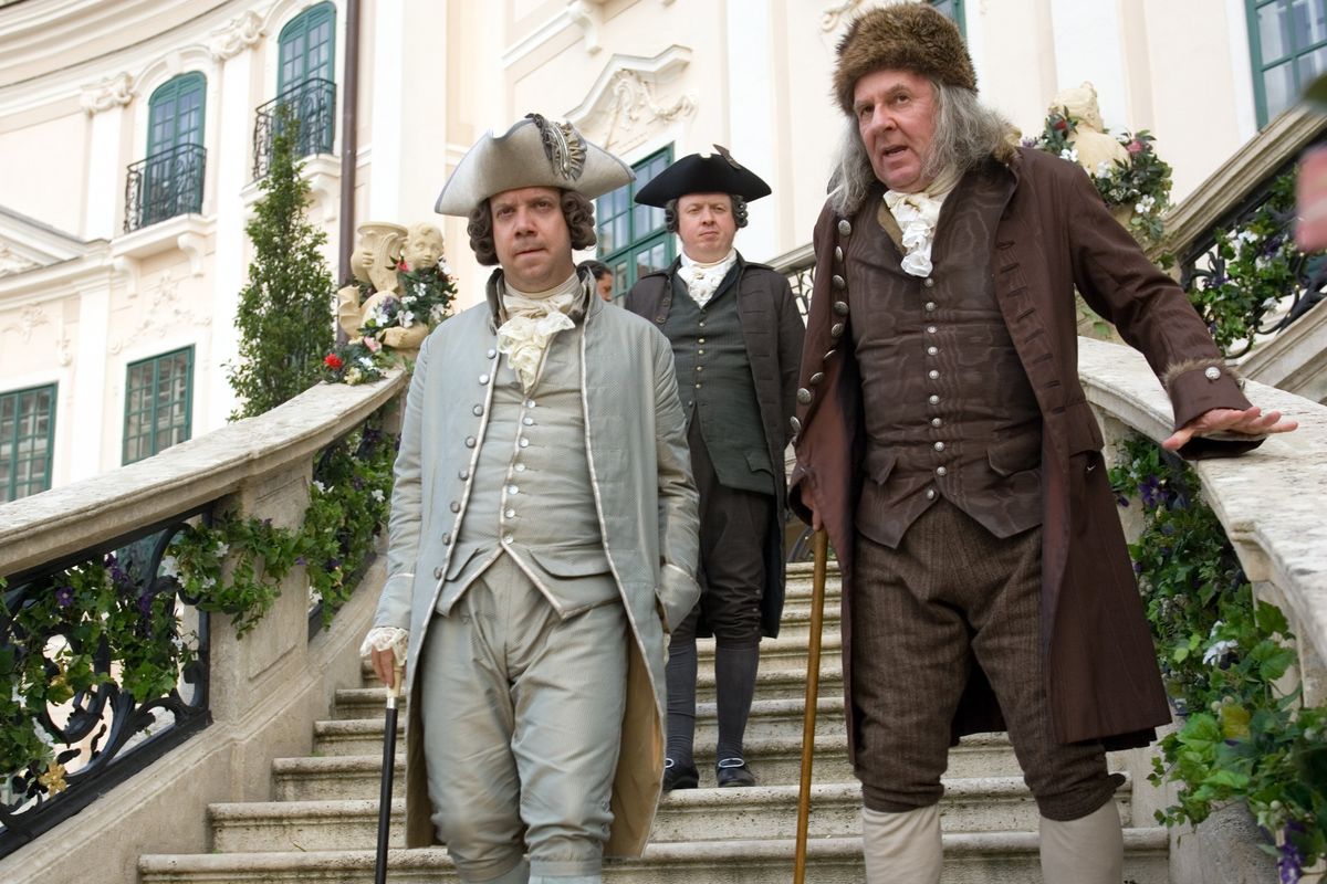 Paul Giamatti portrays John Adams, Sean McKenzie is Edward Bancroft and Tom Wilkinson is Benjamin Franklin in HBO’s “John Adams.”  (Kent Eanes/HBO)