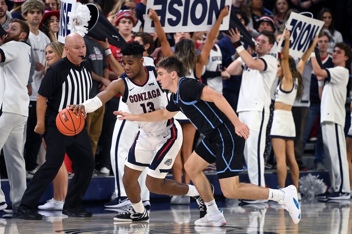 Gonzaga guard Malachi Smith (13) steals the ball from Warner Pacific guard Colton Gorski (13) during the first half of a NCAA college basketball game, Wednesday, Nov. 2, 2022, in the McCarthey Athletic Center.  (COLIN MULVANY/THE SPOKESMAN-REVIEW)