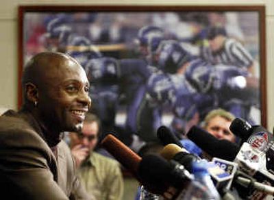 
Wide receiver Jerry Rice was all smiles after learning he'd been traded from the Oakland Raiders to the Seattle Seahawks.
 (Associated Press / The Spokesman-Review)