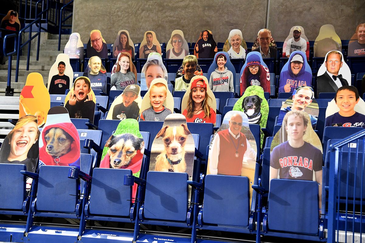 Supporters of Gonzaga University basketball purchased hundreds of Kennel cutouts of themselves, a friend or a pet for $70. They are displayed in the lower seating areas for men
